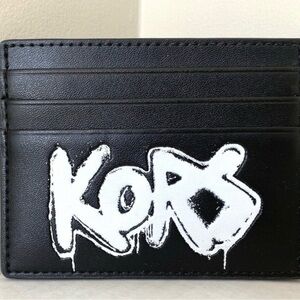 Michael Kors Cooper Tall Card Case in Black/White W/ KORS in White Graffiti